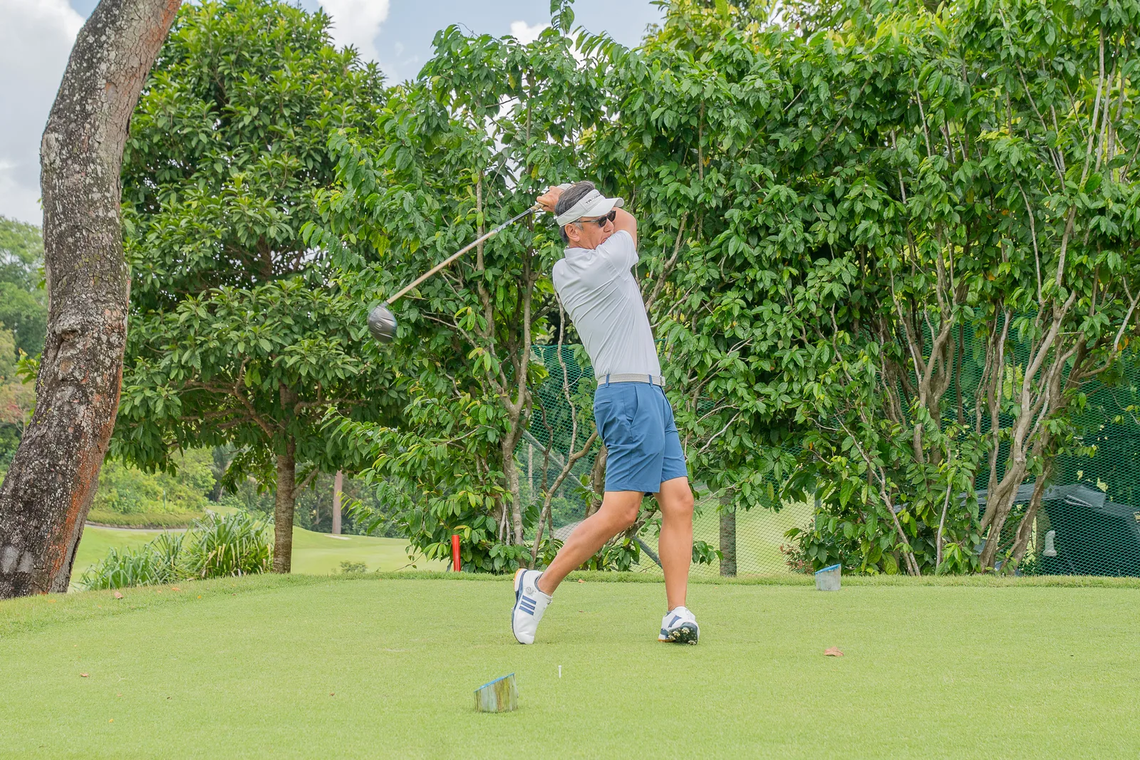 Golfers competing during an interport club match in Singapore
